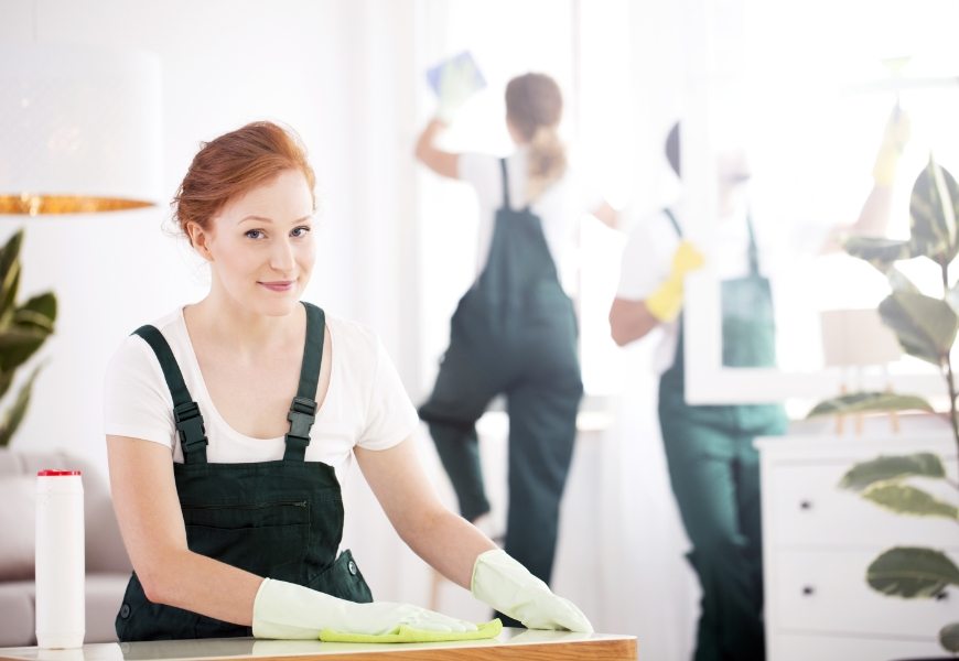 cleaning-lady-dusting-table-PN2PRKW